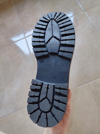 Mocasines negros con flecos y tachuelas T38