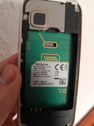 Nokia 5230 Argento, per parti, batteria e caricabatterie.