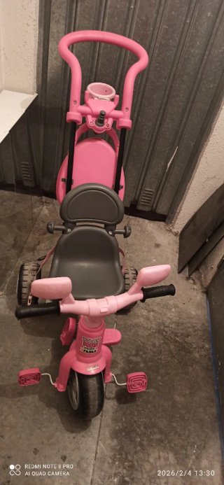 Triciclo rosa para bebé