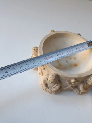 Cenicero y portavelas decorativos