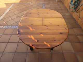 Mesa redonda de madera extensible con cristal