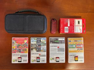 Lote Nintendo Switch con caja + 5 juegos y funda