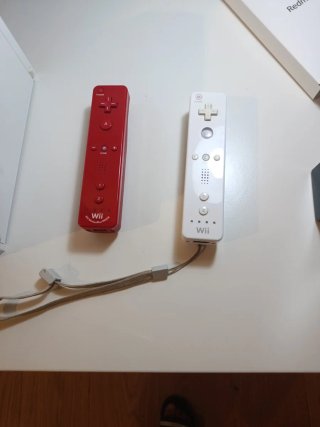 Nintendo Wii con 2 mandos y 5 juegos
