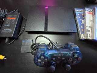 PlayStation 2 Negra + Mando Azul