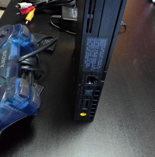 PlayStation 2 Negra + Mando Azul