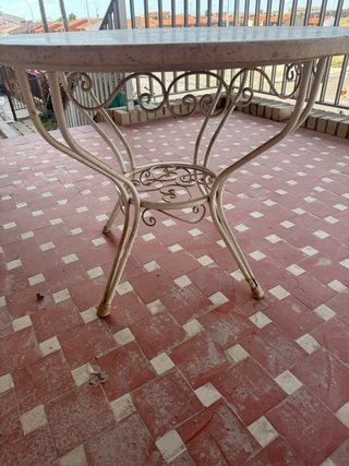 Mesa de exterior piedra y hierro