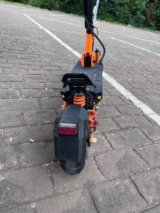 Patinete Eléctrico Naranja/Negro