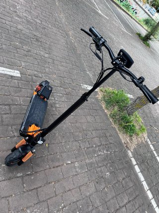 Patinete Eléctrico Naranja/Negro