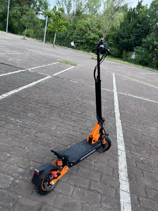 Patinete Eléctrico Naranja/Negro