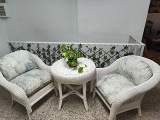 Conjunto de jardín mimbre y tela