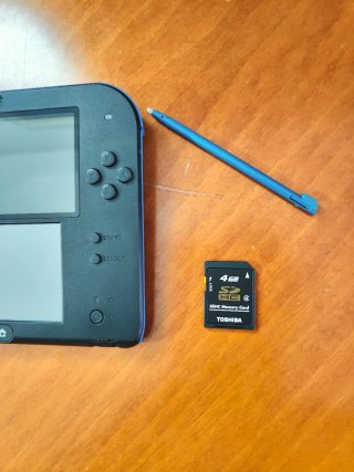 Nintendo 2DS Mario Kart 7 + Caricabatterie