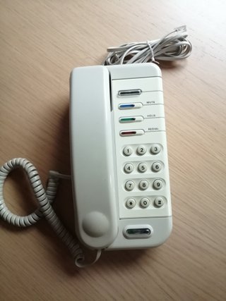 Teléfono fijo vintage blanco crema