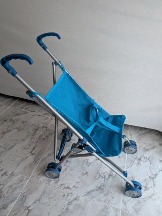 Silla de paseo de juguete azul