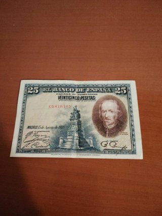 Dos billetes Banco de España: 100 y 25 pesetas