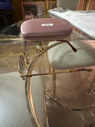 Gafas de sol Miu Miu doradas
