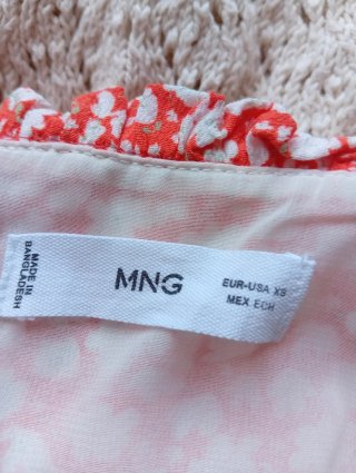 Mono naranja y blanco tirantes estampado floral