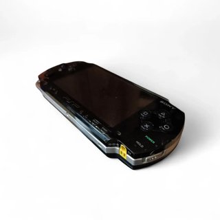 CONSOLA PSP NEGRA + CARGADOR +2 JUEGOS