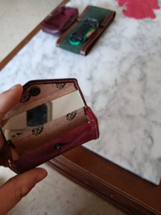 Astuccio vintage in pelle con specchio