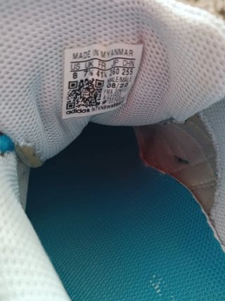 Botas de fútbol sala Adidas blancas y turquesa