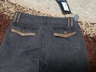 Vaqueros multibolsillos tiro bajo grises