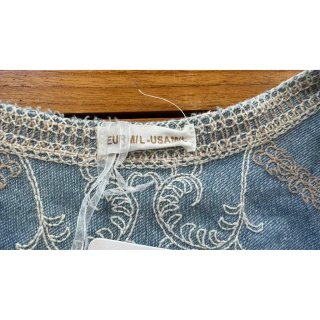 Chaleco vaquero bordado crema y beis
