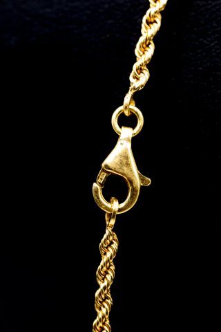 Cadena tipo cordón en oro 18k