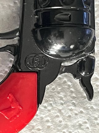 Pistola giocattolo vintage in metallo