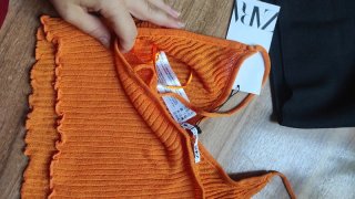 Conjunto 2 Tops Zara talla M naranja y negro