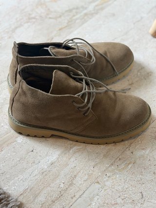 Botas de piel marrón para hombre