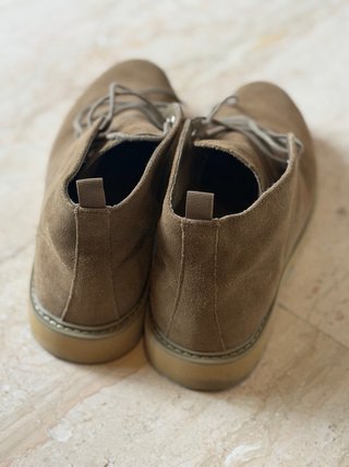 Botas de piel marrón para hombre