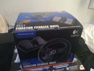 PlayStation 2 Negra + Volante + Mandos