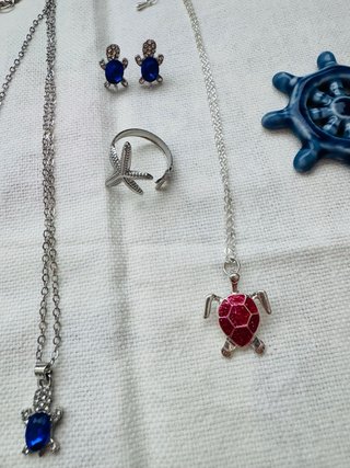 Set gioielli tartaruga azzurri, verde e argento