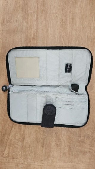 Cartera Kipling documentos viaje azul marino