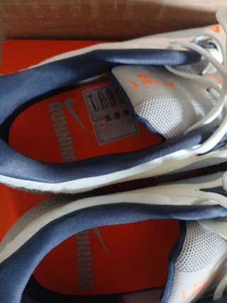Zapatillas Running Nike Blancas y Naranja