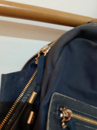 Mochila Tous azul y dorada