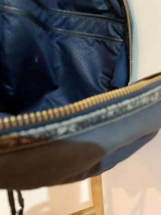 Mochila Tous azul y dorada