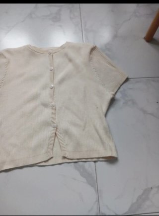 Top corto crema de punto
