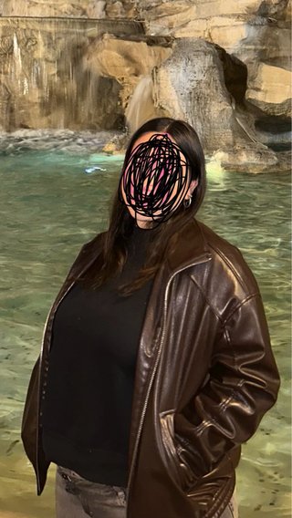 Piumino nero con patch