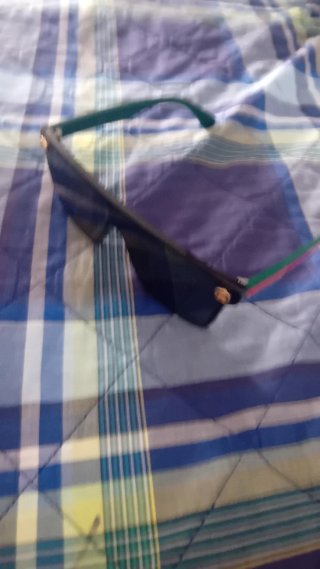 Occhiali da sole Gucci neri e verdi