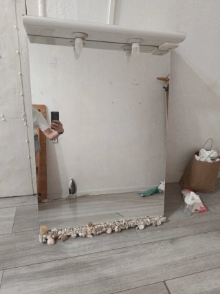 Espejo de baño decorado con conchas d