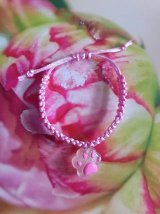 Pulsera hecha a mano con dije de huella