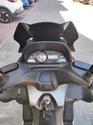 Cambio o vendo Kymco Xciting 400i leovince