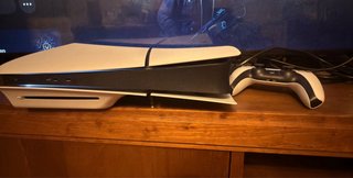PS5 Slim 1TB con lector + mando (x2) + 3 juegos
