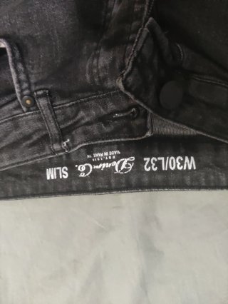 Pantalones vaqueros slim grises