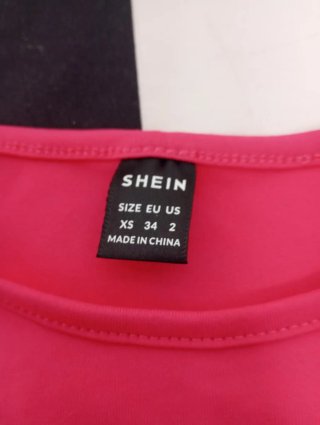 Camiseta manga larga crop top fucsia