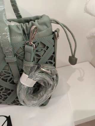 Bolso Don Algodón verde de hombro y mano