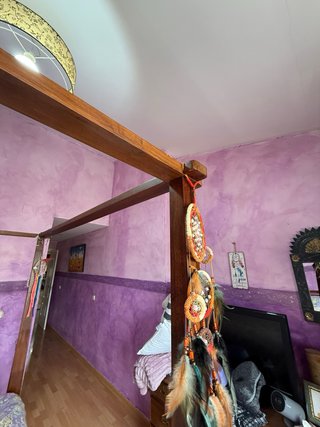 Cama con dosel de madera maciza provenientede Asia