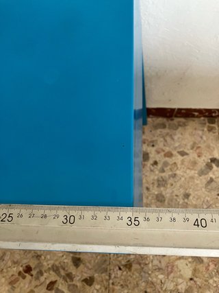 Mesita auxiliar metálica de Ikea azul con cajón