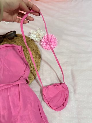 Vestido rosa bebé con bolsito