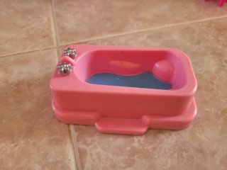 Giocattoli per casetta delle bambole
